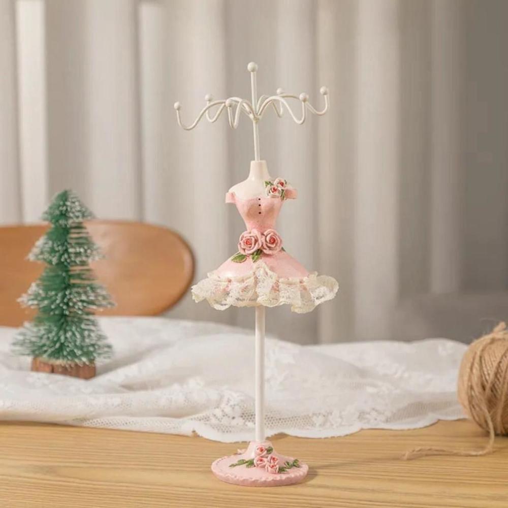 Rotating Jewelry Rack In Pink Dress